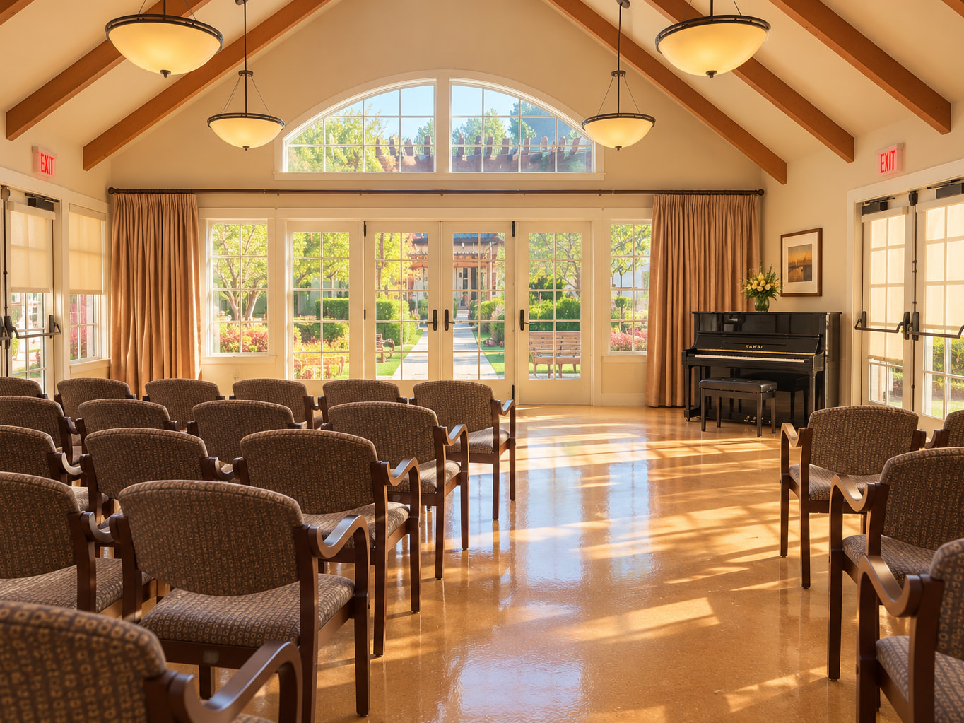 Piano and seating in the wood-beamed event space at Villa Siena Senior Living.
